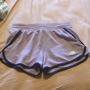 Purple Adidas track shorts